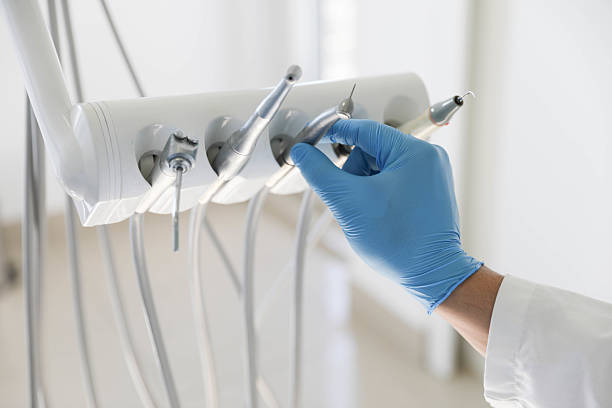 Professional Tooth Extraction technician working in Sallisaw, OK